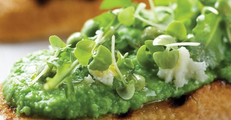 Centrifuged Green Pea Butter Crostini with Arugula and Broken Vinaigrette