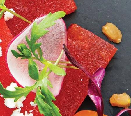 Compressed Watermelon with Aged Balsamic Vinaigrette, Feta Crumble, Fresh Radish, and Sous Vide Farro